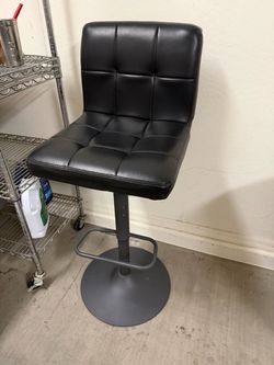 One Black Adjustable Bar Stool