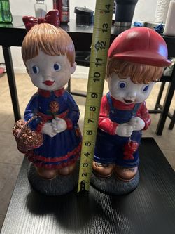 Little Boy And Girl Statues