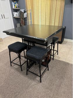 Tall table w/ 4 upholstered stools and storage