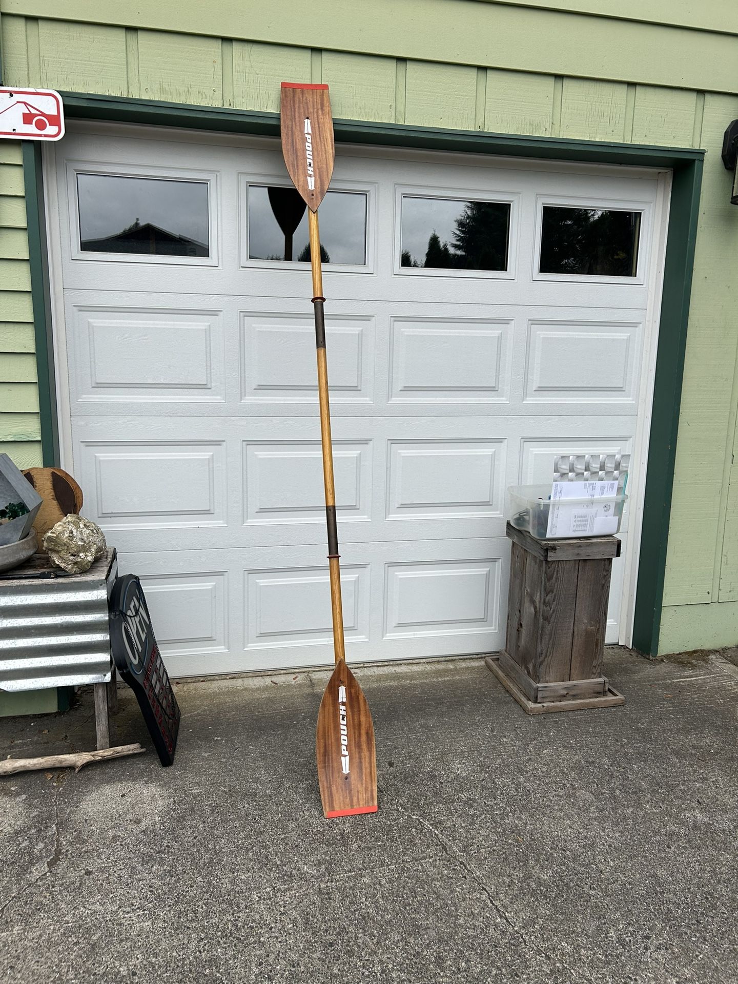 Older Pouch wooden Kayak paddle in good shape.  Still fully functional, but would make a great man cave  wall decoration also  $50, cash or Venmo, mee