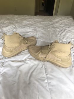 Gold Puma Fenty Rihanna collection sneakers