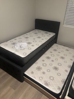 Full over twin size bed frame with mattresses