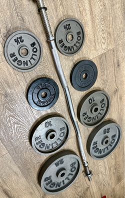 Gently USED Standard Equipment: Curl Bar with Cast Iron Weight Plates 25s, 10s, 5s and 2.5s. (Total: 103 lbs)