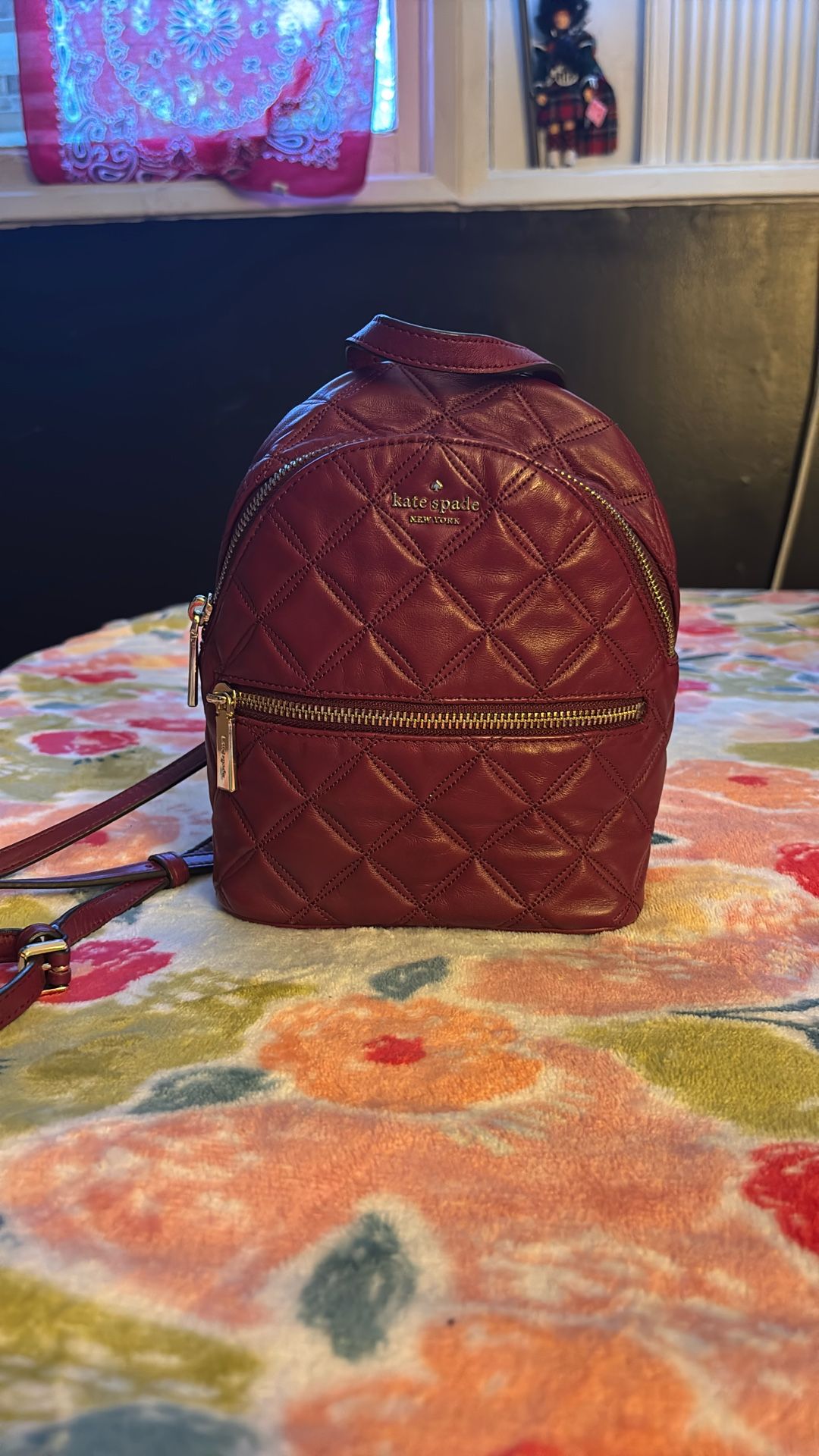 Kate Spade small brand, new backpack, burgundy and color