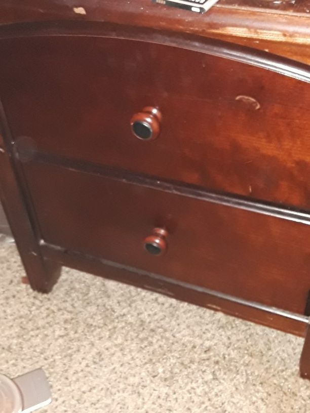 Cherry wood dresser set by Bassett furniture.