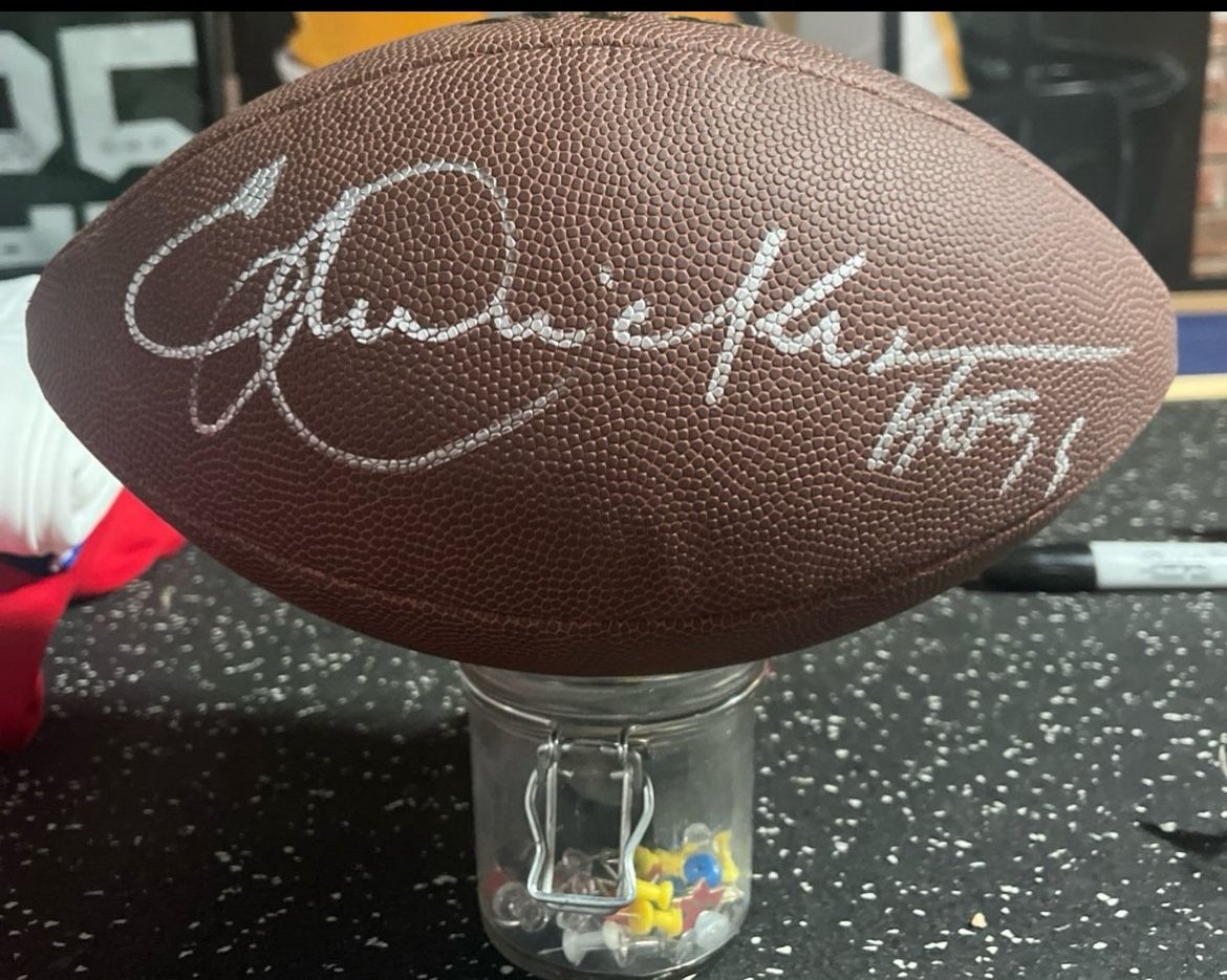 Signed full-size fooSigned full-size football by Eric Dickerson with hologram!