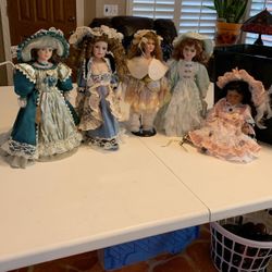 5 Porcelana Dolls  Each $7  Or All 7 For  $25.00