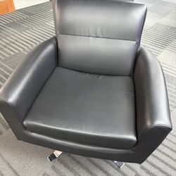 Swivel faux leather chair