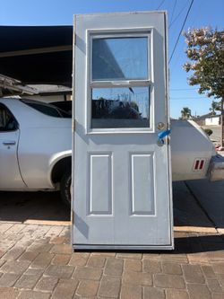 32” x 80” Insulated Exterior Door with Frame & Window – $125