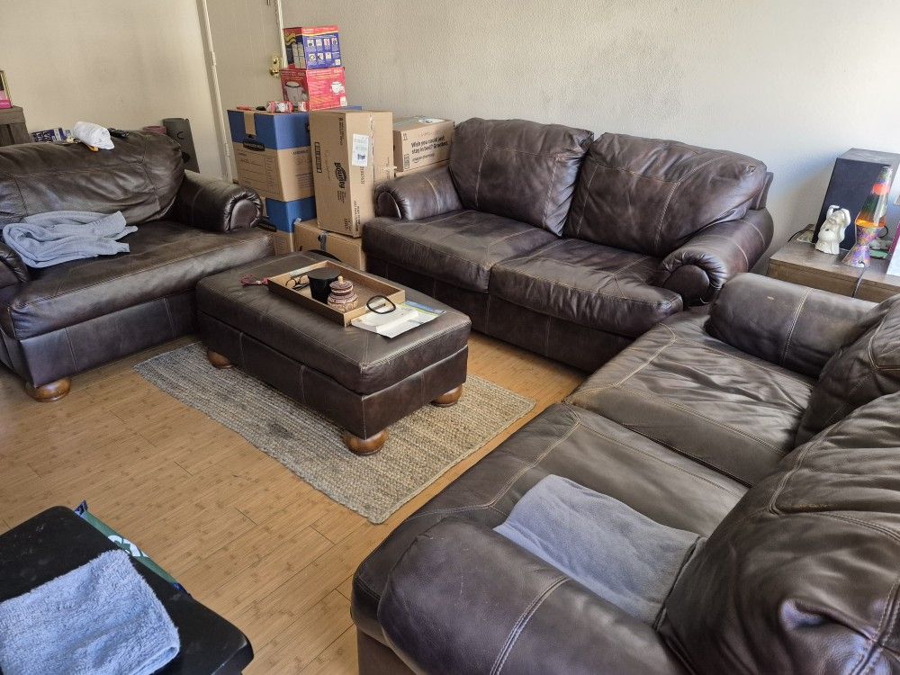 Leather Love Seats. Ottoman. Chair. $300