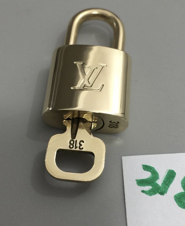 Authentic Louis Vuitton Lock And Key 318 for Sale in West Covina, CA -  OfferUp