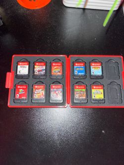 Nintendo games with game holder  (Negotiable) and pick up only