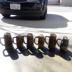 Antique beer steins (6)