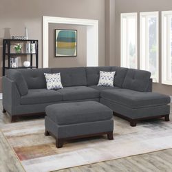 GREY REVERSIBLE CHAISE SECTIONAL WITH OTTOMAN AND PILLOWS