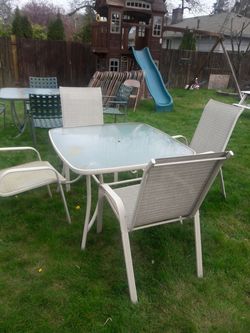 Square patio set, a pressure wash and is ready for summer!
