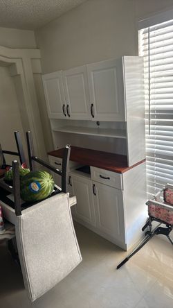 Brown and white wood cabinet