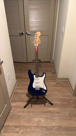 he Squier Sonic Stratocaster HSS in Midnight Blue