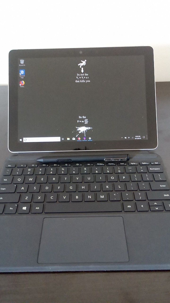 Microsoft Surface Go with keyboard and bamboo pen