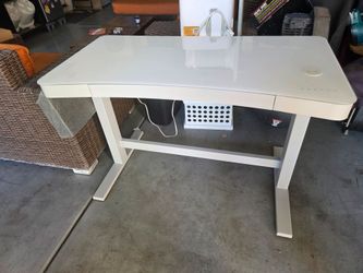 Desk with adjustable lift and drawer