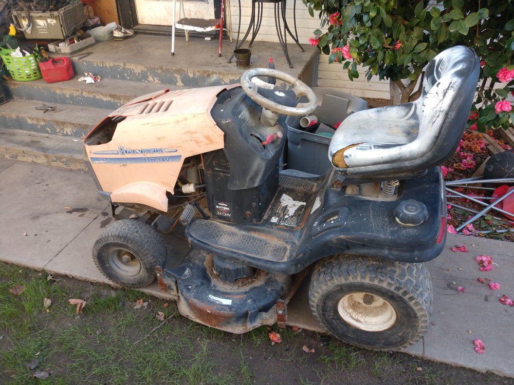 Riding lawn mower for parts asking 150