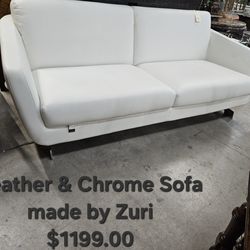 Sofa Faux Leather Chrome baseWe are located at 2811 East Bell road. Another Time Around Furniture.