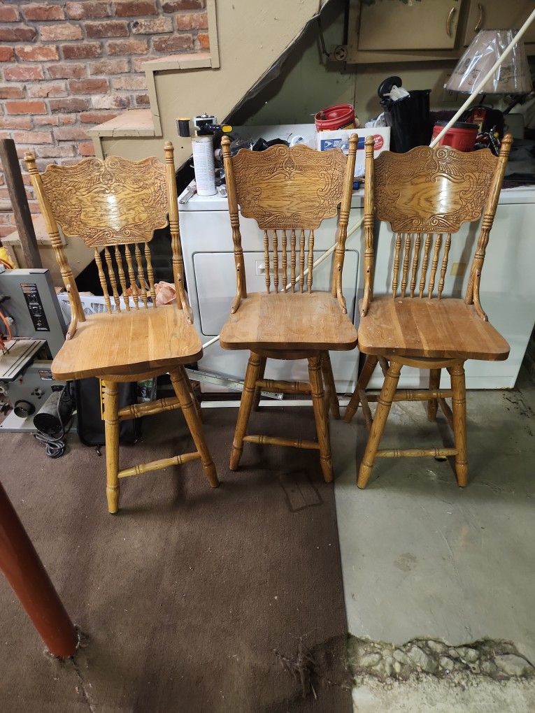 Set Of 3 Amish Swivel Oak Barstools