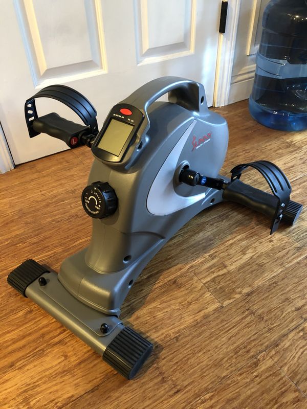 sunny health & fitness magnetic mini exercise bike with digital monitor and 8 level resistance