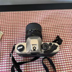 Nikon FM10 35mm SLR Film Camera w/ Ai 28mm F2.8 Lens