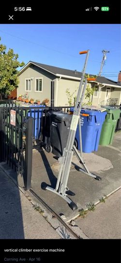 Free vertical climber exercise machine