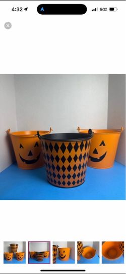 set of decorative metal buckets for display