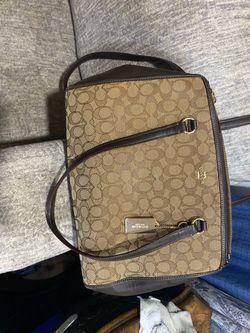 Coach Stanton Carryall in brown signature canvas with dark leather trim
