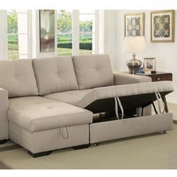IVORY SECTIONAL WITH REVERSIBLE STORAGE CHAISE…. FREE DELIVERY!!