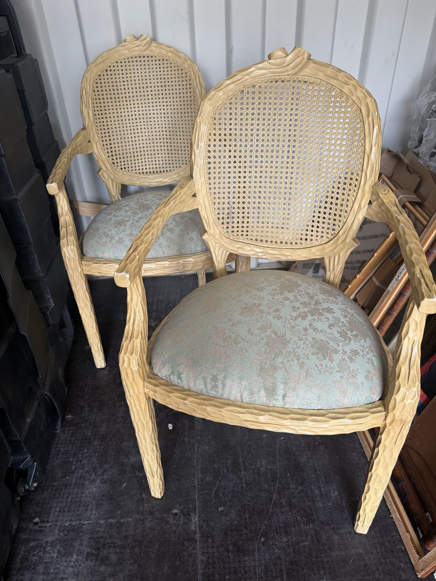 Pair of vintage cane back faux bois chairs.