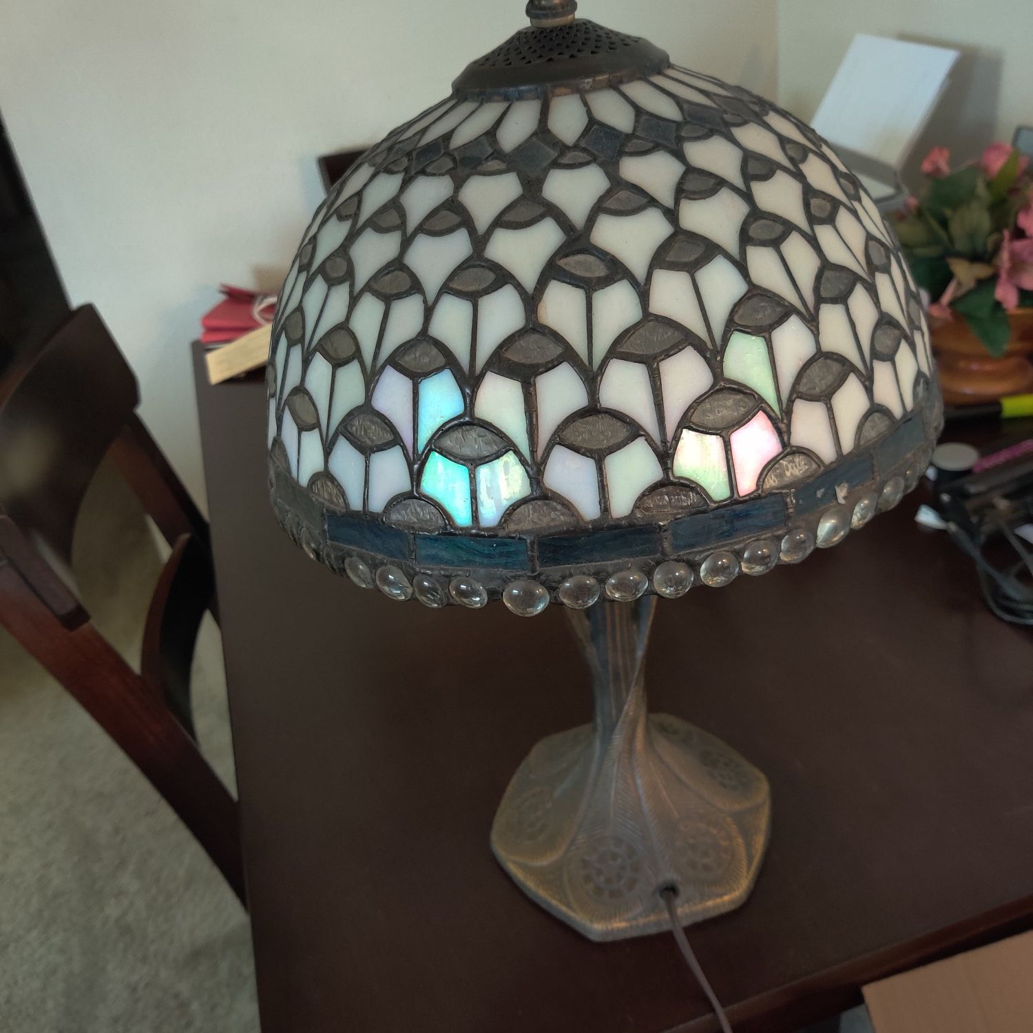 Tiffany style lamp with brass base.