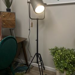 {ONE} Cauley 61'' Tripod Floor Lamp. Overall: 61'' H X 22'' W X 22'' D. Color: black. Has slight wear (see photos). MSRP: $242. Our price: $158 + Sale
