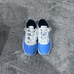 White/blue Jordan 11 Low Cmft 