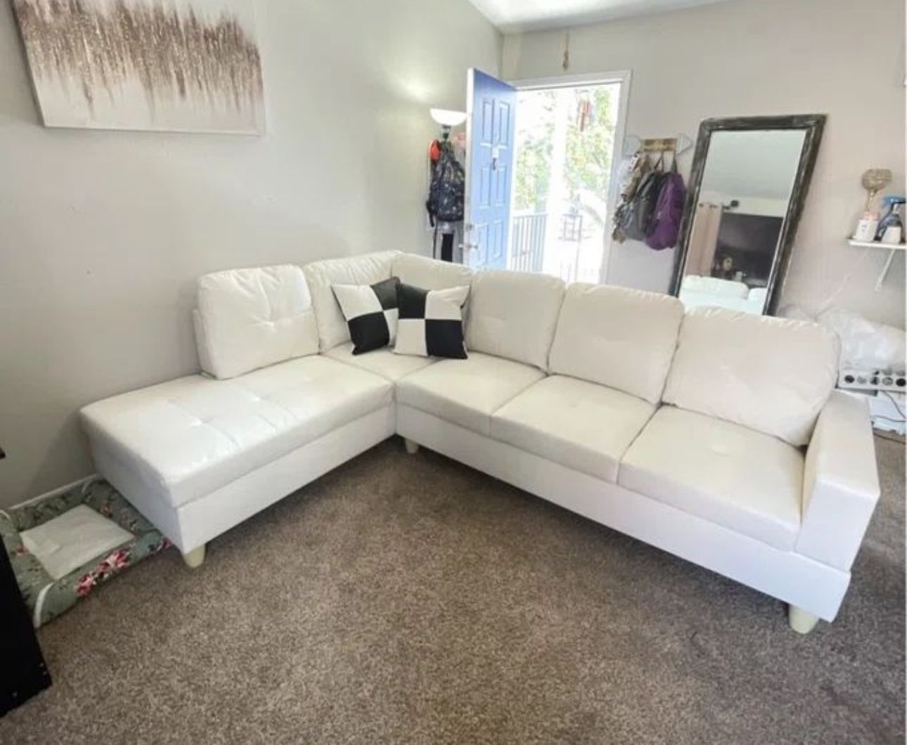 White Leather Sectional Couch And Ottoman