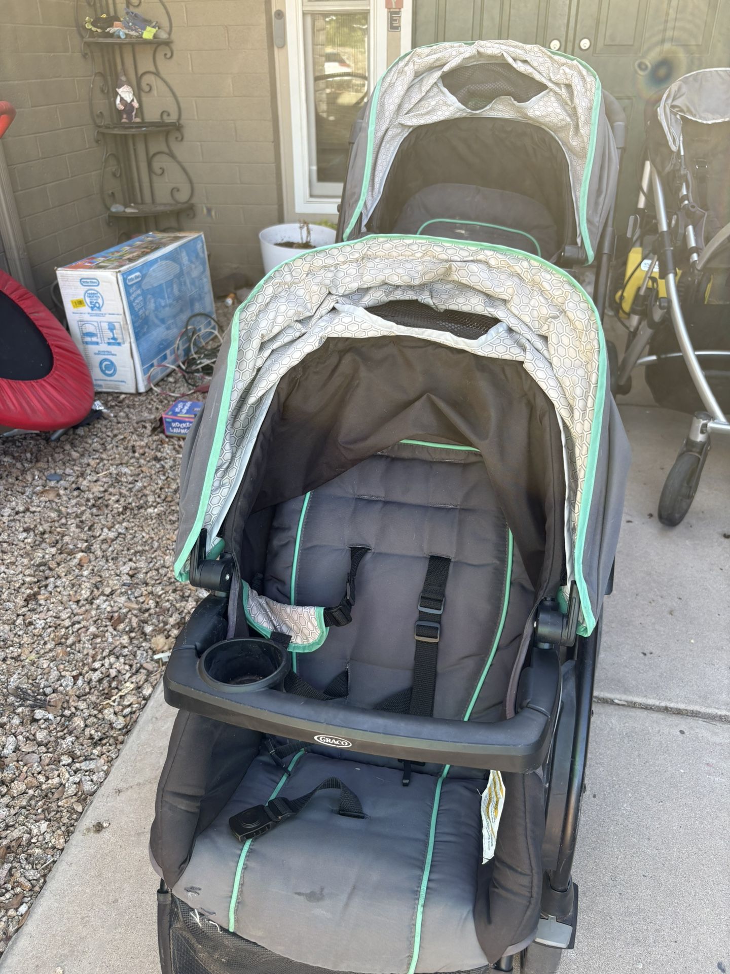 Graco Double Stroller With Sit And Stand Feature.
