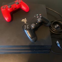 PS4 Pro 1TB w/ two controllers and two games