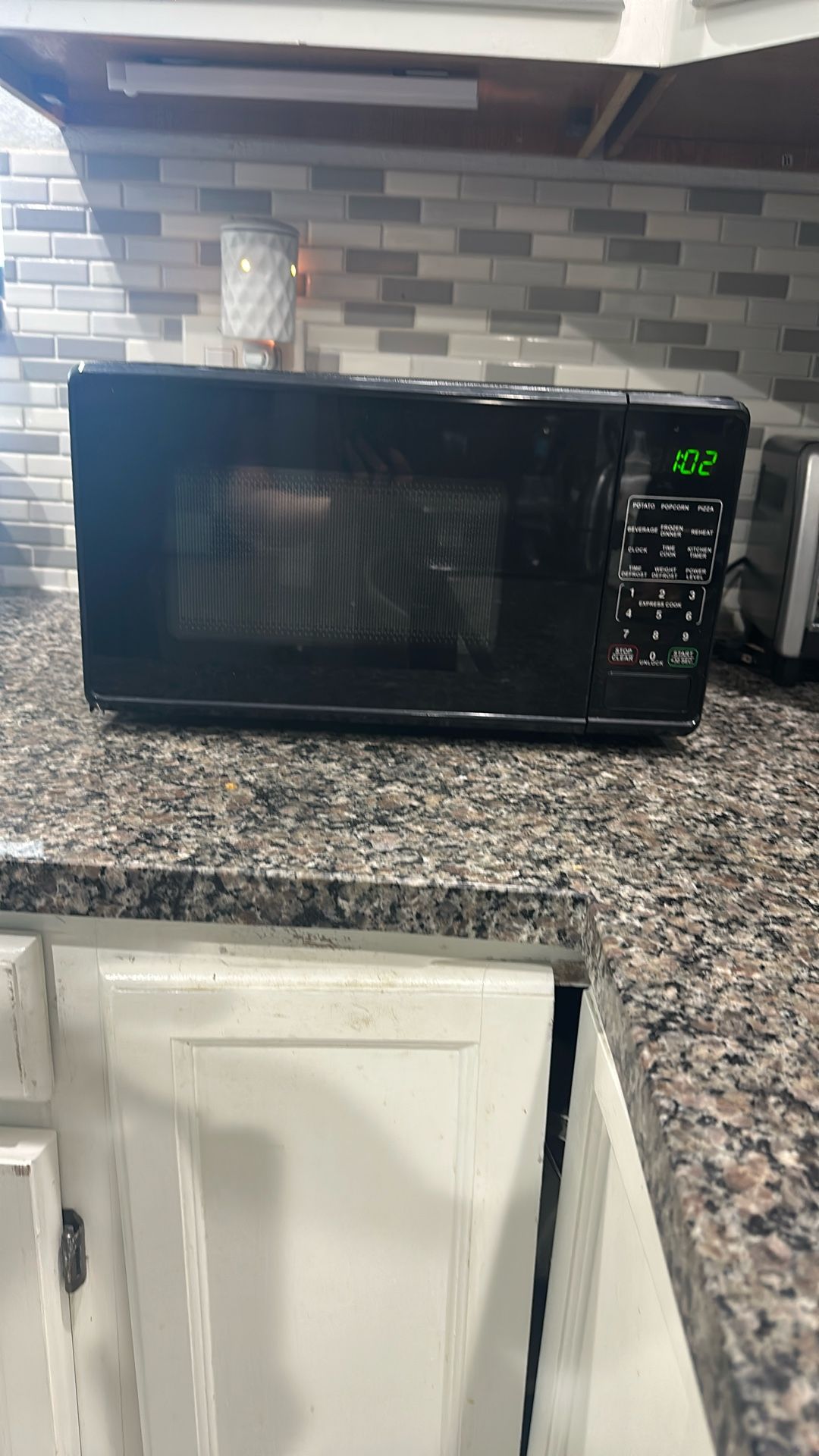 Small Black microwave 700 Watts