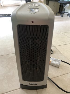 Delonghi Tch7090er Safeheat 24 In Ceramic Tower Heater With Remote Control And Eco Energy Function Smart Tower Fan