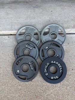 Cap Olympic Barbell Grip Weight Plates $35