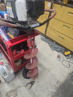 Gas powered post hole digger