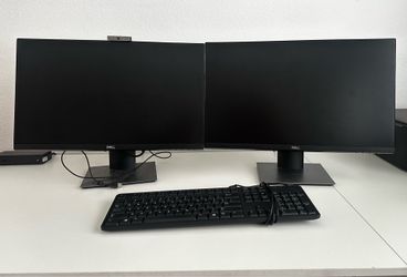 Dell monitors, dell key board, mouse and camera