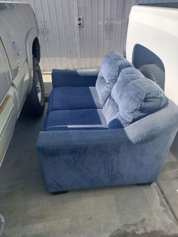 Blue couch, love seat