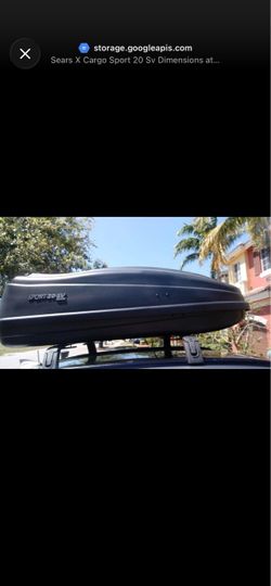 Large automobile roof mount cargo carrier