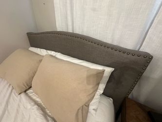 Gray upholstered bed