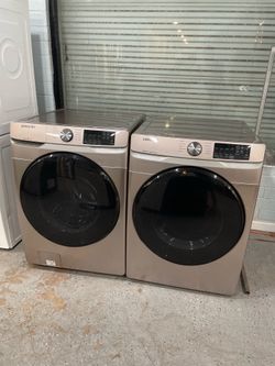 Conjunto de lavadora y secadora eléctrica marca Samsung