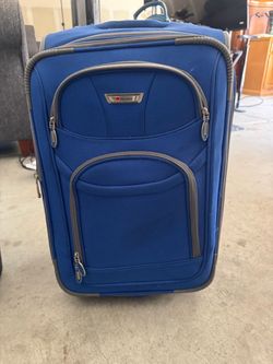 Delsey Blue Carry-On Rolling Suitcase – Lightweight Luggage