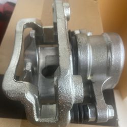 A Premium Disc Brake Caliper Assembly W/ Bracket 